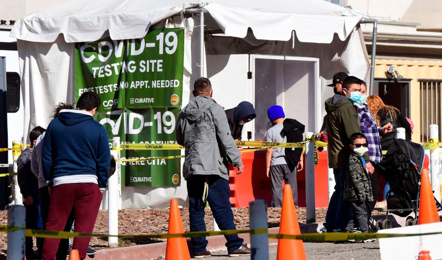 People arrive at a walk-up COVID-19 testing site at Lincoln Park in Los Angeles on Jan. 28, 2021. (Frederic J. Brown / AFP / Getty Images)