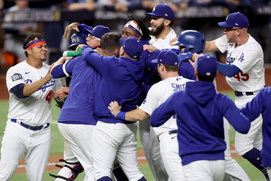 The Los Angeles Dodgers celebrate after defeating the Tampa Bay Rays 3-1 in Game Six to win the 2020 MLB World Series at Globe Life Field on Oct. 27, 2020 in Arlington, Texas. (Tom Pennington/Getty Images)