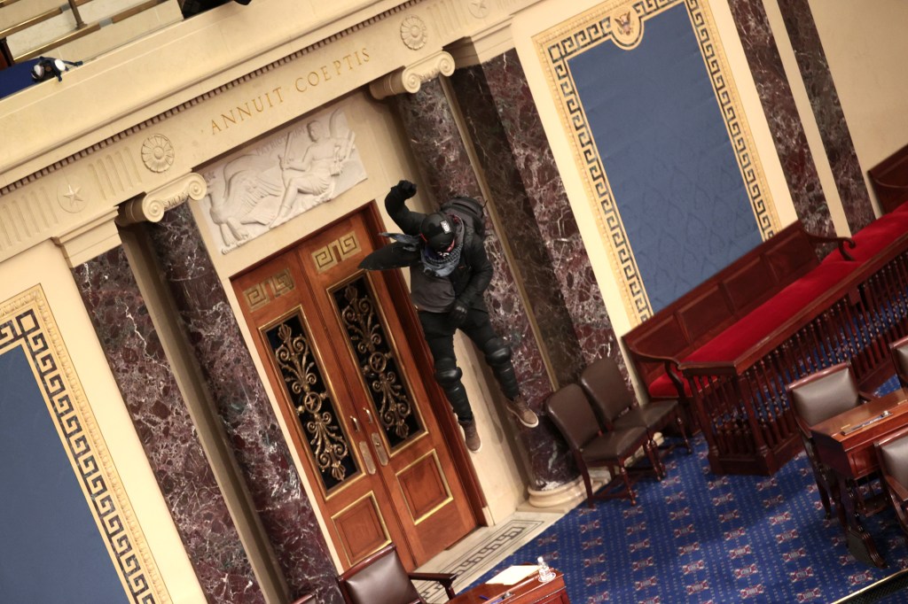 Protesters enter the Senate Chamber on January 06, 2021 in Washington, DC. (Win McNamee/Getty Images)