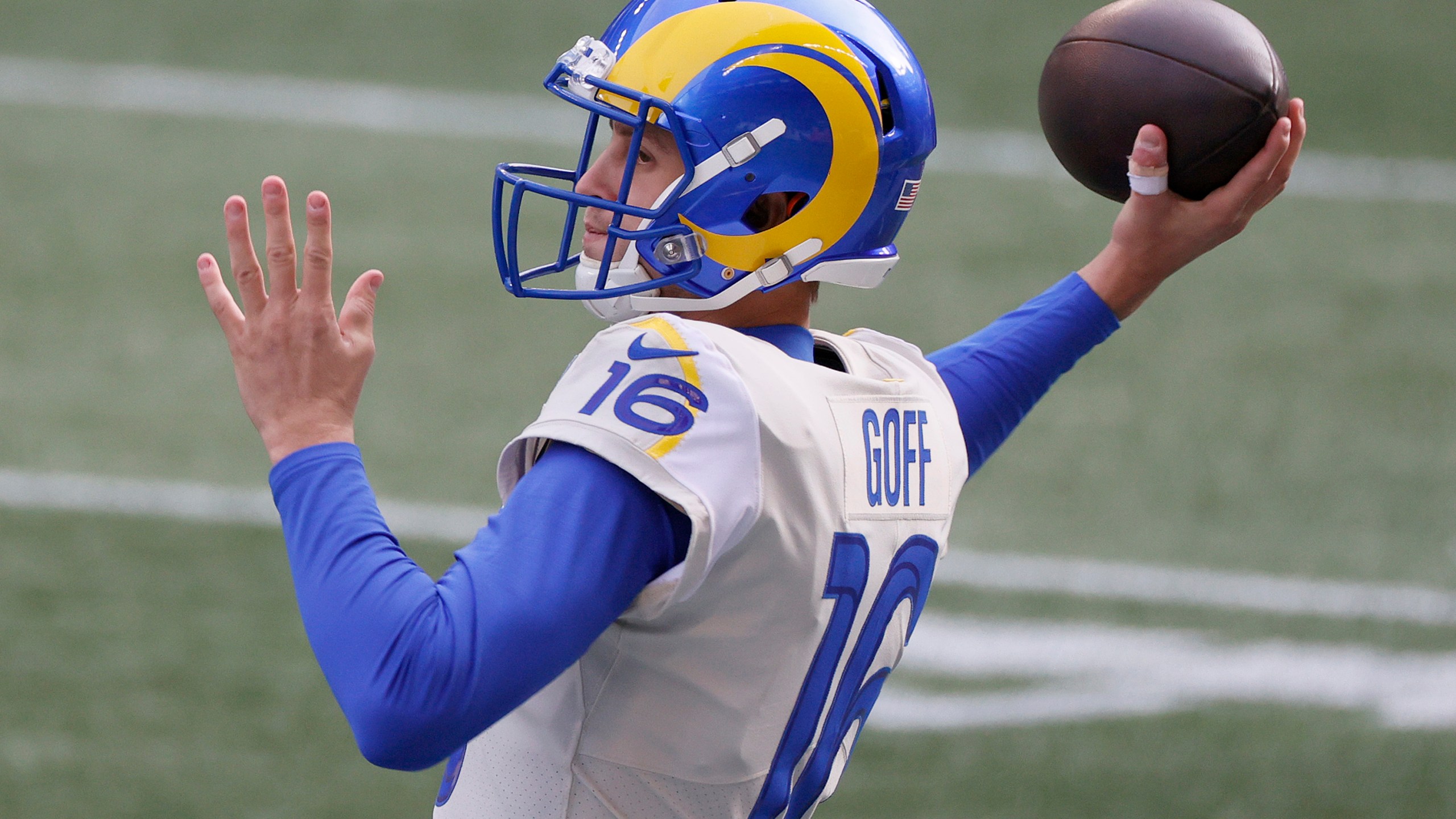 Jared Goff #16 of the Los Angeles Rams warms up before the game against the Seattle Seahawks in an NFC Wild Card game at Lumen Field on Jan. 9, 2021, in Seattle, Washington. (Steph Chambers/Getty Images)