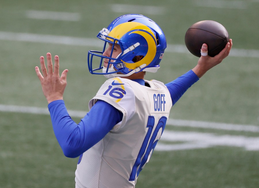 Jared Goff #16 of the Los Angeles Rams warms up before the game against the Seattle Seahawks in an NFC Wild Card game at Lumen Field on Jan. 9, 2021, in Seattle, Washington. (Steph Chambers/Getty Images)