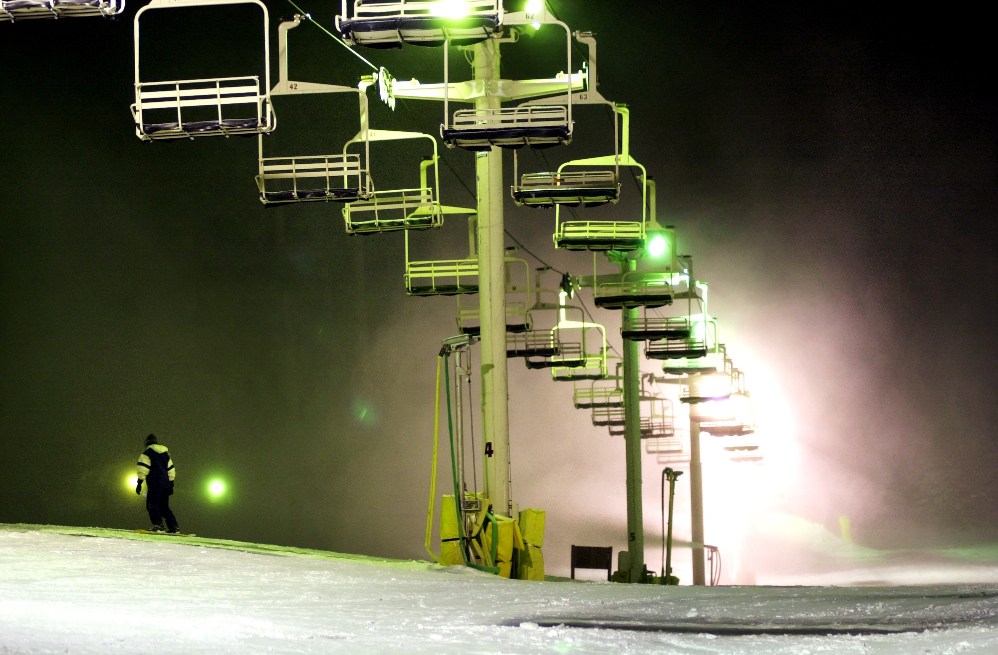 Skiers take advantage of well-lit slopes through the night at Mountain High ski resort, January 24, 2001 near Wrightwood, CA, as the statewide energy crisis continues. (David McNew/Newsmakers)