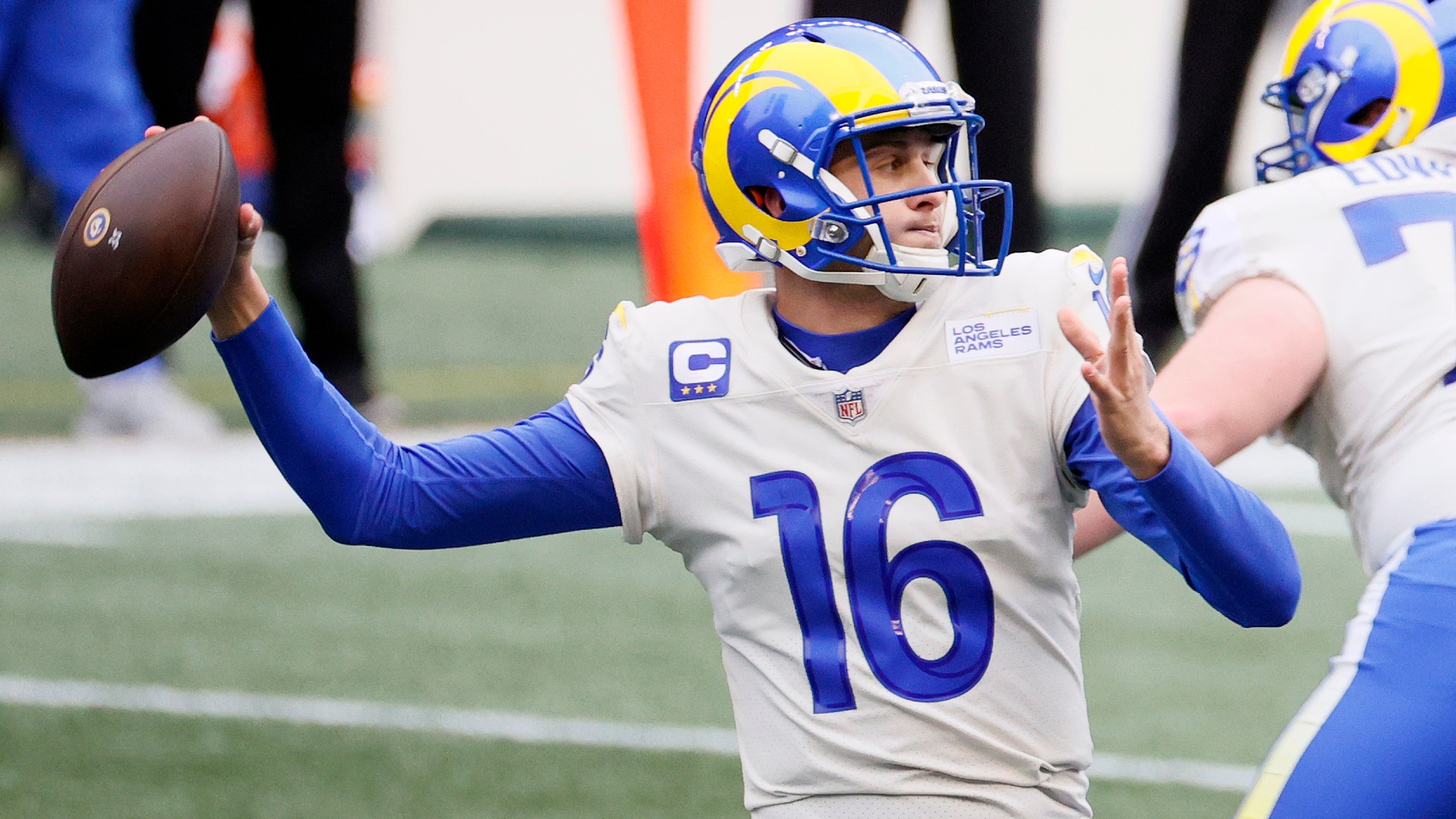 Jared Goff #16 of the Los Angeles Rams looks to pass against the Seattle Seahawks during the first quarter in an NFC Wild Card game at Lumen Field on January 09, 2021 in Seattle, Washington. (Steph Chambers/Getty Images)