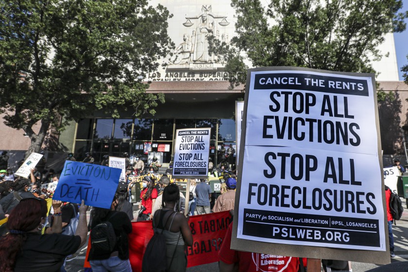 Tenants activists rally at Stanley Mosk Courthouse in downtown Los Angeles to protest eviction orders issued against renters in September 2020. (Irfan Khan / Los Angeles Times)