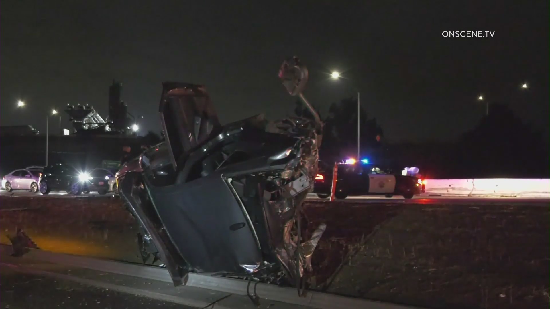 A severely damaged vehicle is seen after a deadly crash on the 10 Freeway in Pomona on Jan. 25, 2021. (Onscene.tv)