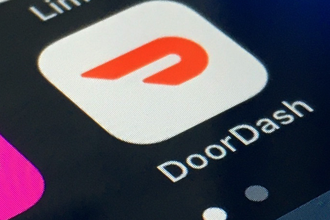 The DoorDash app is shown on a smartphone on Feb. 27, 2020, in New York. (AP Photo)