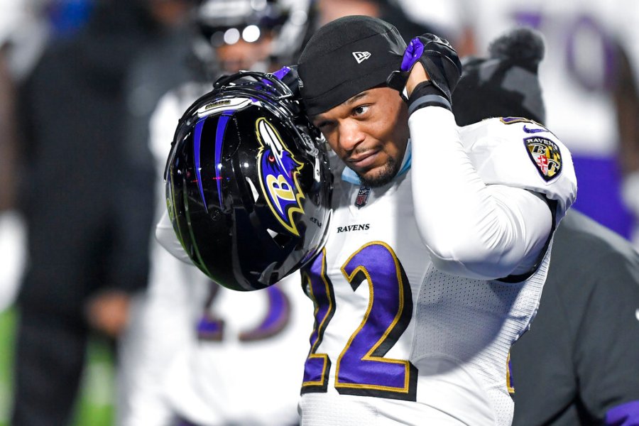 Baltimore Ravens cornerback Jimmy Smith (22) warms up before an NFL divisional round football game against the Buffalo Bills Saturday, Jan. 16, 2021, in Orchard Park, N.Y. (AP Photo/Adrian Kraus)