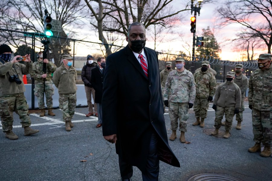 Secretary of Defense Lloyd Austin visits National Guard troops deployed at the U.S. Capitol and its perimeter, Friday, Jan. 29, 2021 on Capitol Hill in Washington. (AP Photo/Manuel Balce Ceneta)