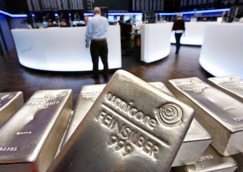 In this file photo dated Wednesday, May 9, 2007, Silver bullion, bars weighing five kilograms each, are displayed in the trading room of the stock exchange in Frankfurt, Germany. (AP Photo/Michael Probst, FILE)