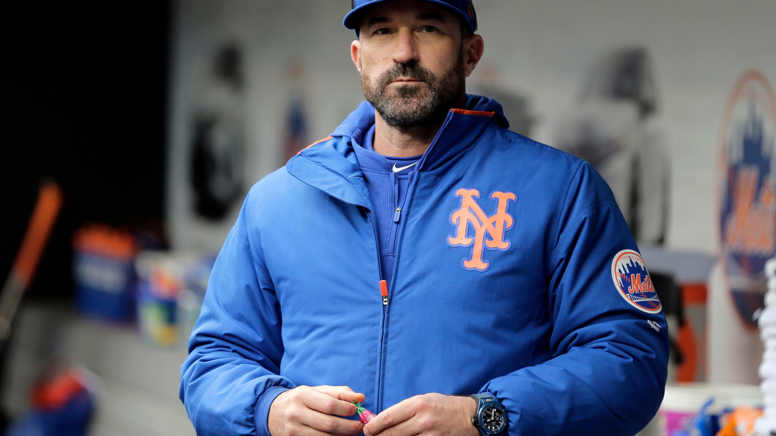 In this Sunday, April 28, 2019, file photo, then-New York Mets manager Mickey Callaway stands by the dugout before a baseball game against the Milwaukee Brewers at Citi Field, in New York. (AP Photo/Seth Wenig)