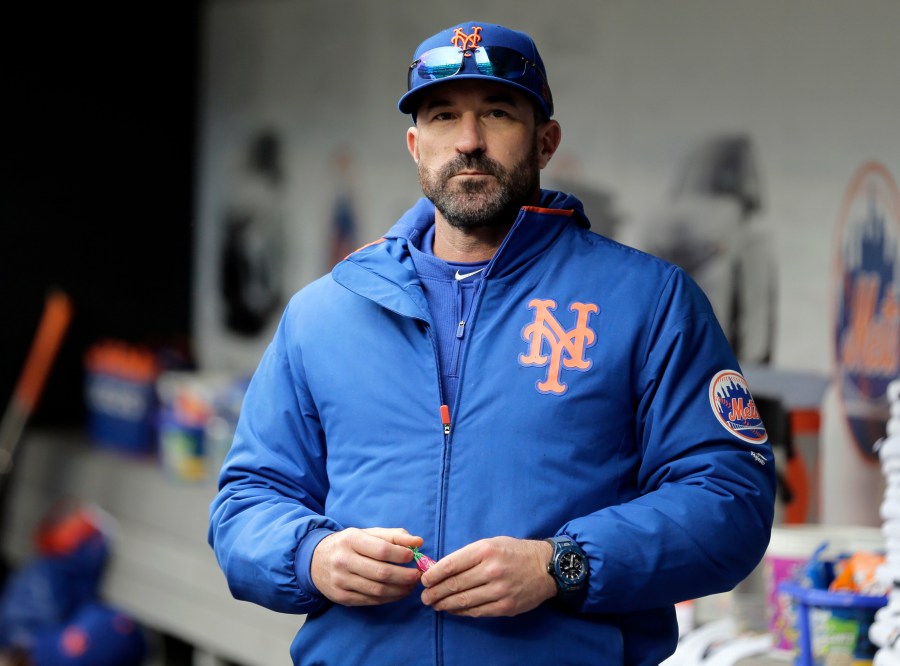 In this Sunday, April 28, 2019, file photo, then-New York Mets manager Mickey Callaway stands by the dugout before a baseball game against the Milwaukee Brewers at Citi Field, in New York. (AP Photo/Seth Wenig)