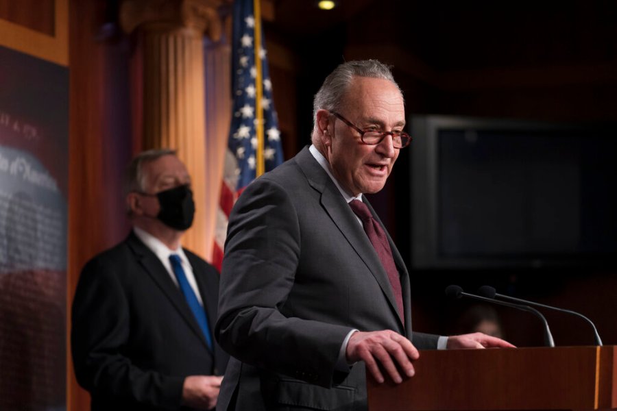 Senate Majority Leader Chuck Schumer, D-N.Y., joined at left by Sen. Dick Durbin, D-Ill., the majority whip, speaks at a news conference at the Capitol in Washington, Tuesday, Feb. 2, 2021. (AP Photo/J. Scott Applewhite)