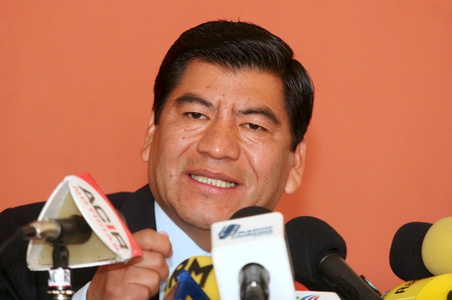 In this Feb. 15, 2006 file photo, the governor of the Mexican state of Puebla, Mario Marin speaks during a news conference in Puebla, Mexico. Mexican authorities arrested on Feb. 3, 2021 the former governor on charges that he had a reporter who investigated his role in a pedophilia ring illegally arrested and tortured, an official said Thursday, Feb. 4, 2021. (AP Photo/Joel Merino, File)