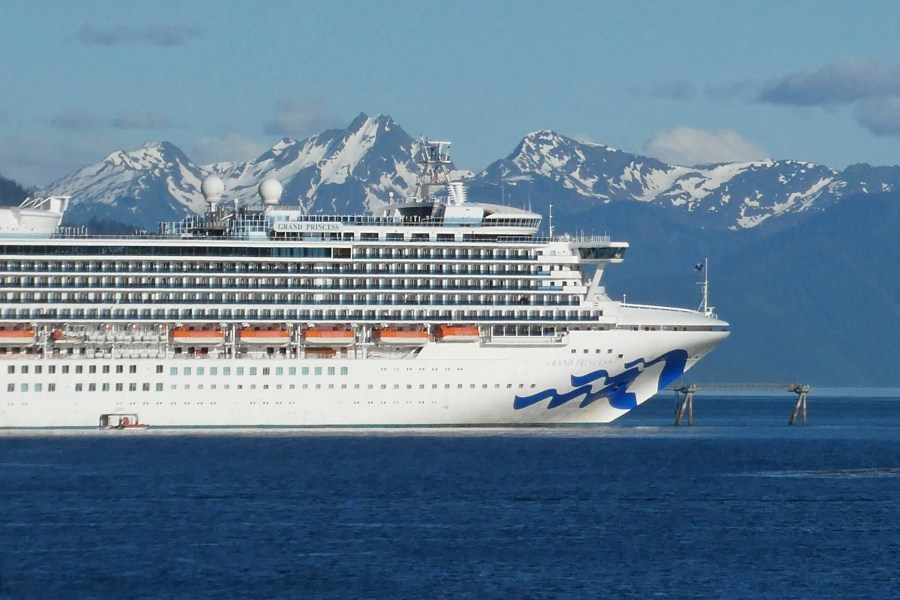 In this May 30, 2018, file photo, is the Grand Princess cruise ship in Gastineau Channel in Juneau, Alaska. The Canadian government has extended a ban on cruise ships through February 2022, which is expected to block trips from visiting Alaska this year. Transport Canada announced the extension of the ban put in place because of the COVID-19 pandemic. (AP Photo/Becky Bohrer, File)