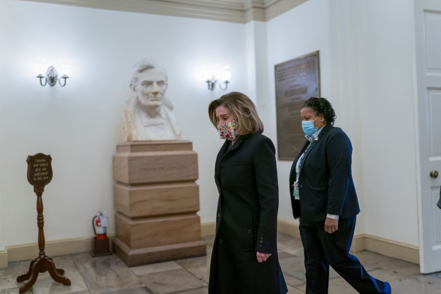 Speaker of the House Nancy Pelosi, D-Calif., arrives at the Capitol in Washington, Monday, Feb. 8, 2021, on the eve of the second impeachment trial of former President Donald Trump. The trial will begin Tuesday with a debate and vote on whether it's even constitutional to prosecute the former president, an argument that could resonate with Republicans keen on voting to acquit Trump. (AP Photo/J. Scott Applewhite)