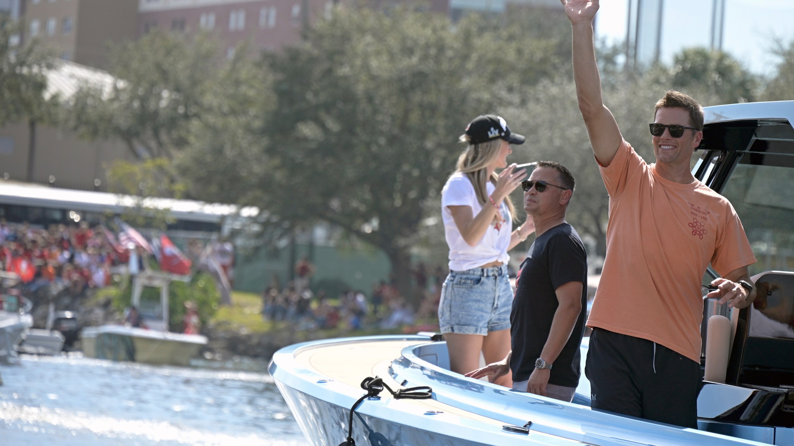 Tampa Bay Buccaneers NFL football quarterback Tom Brady waves to fans as he celebrates their Super Bowl 55 victory over the Kansas City Chiefs with a boat parade in Tampa on Feb. 10, 2021. (Phelan Ebenhack/Associated Press)