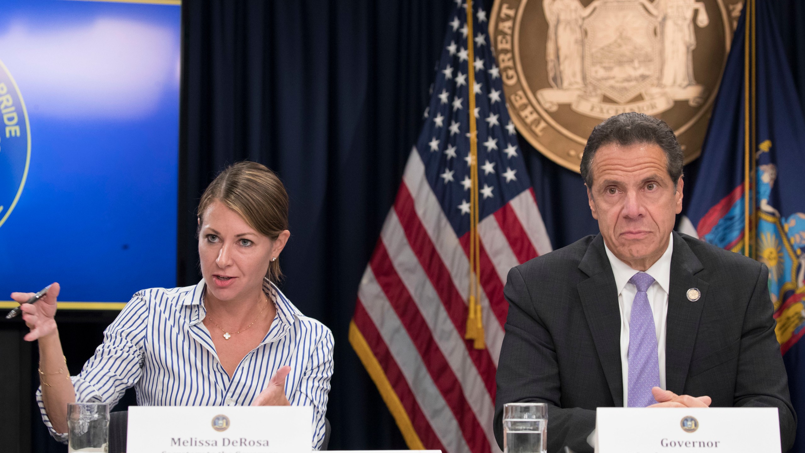 In this Sept. 14, 2018 file photo, Secretary to the Governor Melissa DeRosa, is joined by New York Gov. Andrew Cuomo as she speaks to reporters during a news conference, in New York. De Rosa, Cuomo's top aide, told top Democrats frustrated with the administration's long-delayed release of data about nursing home deaths that the administration "froze" over worries about what information was "going to be used against us," according to a Democratic lawmaker who attended the Wednesday, Feb. 10, 2021 meeting and a partial transcript provided by the governor's office. (AP Photo/Mary Altaffer, File)