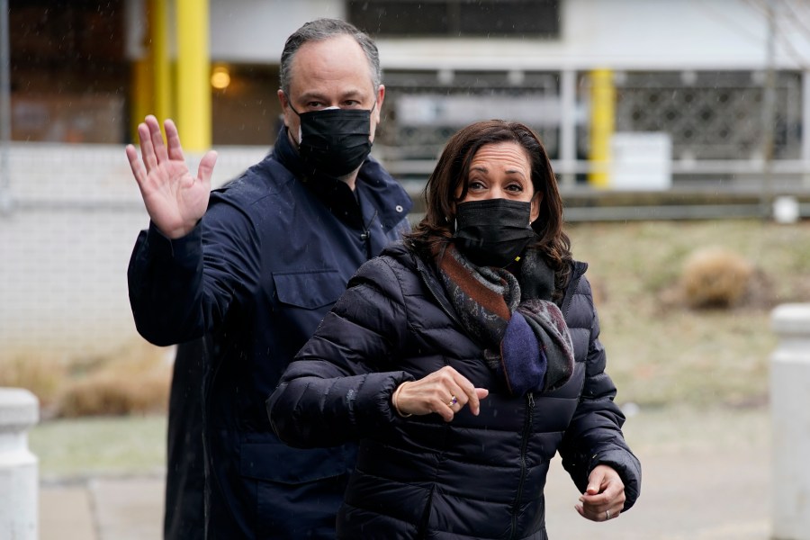 Vice President Kamala Harris and her husband Doug Emhoff depart after delivering baskets of cookies to health care workers at the VA Medical Center in Washington on Feb. 13, 2021. (AP Photo/Patrick Semansky)