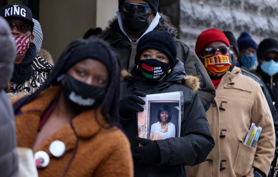 People wait IN line to attend a public viewing for Cicely Tyson at the Abyssinian Baptist Church in the Harlem neighborhood of New York, Monday, Feb. 15, 2021. (AP Photo/Craig Ruttle)