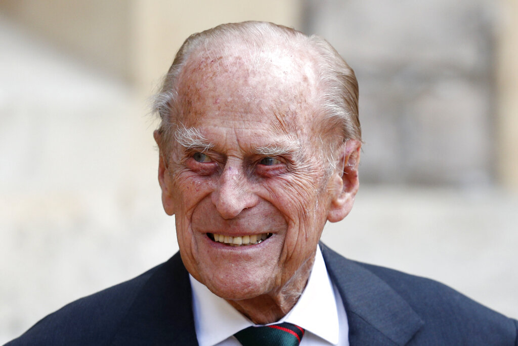 In this Wednesday July 22, 2020 file photo, Britain's Prince Philip arrives for a ceremony for the transfer of the Colonel-in-Chief of the Rifles from himself to Camilla, Duchess of Cornwall, at Windsor Castle, England. (Adrian Dennis/Pool via AP, File)