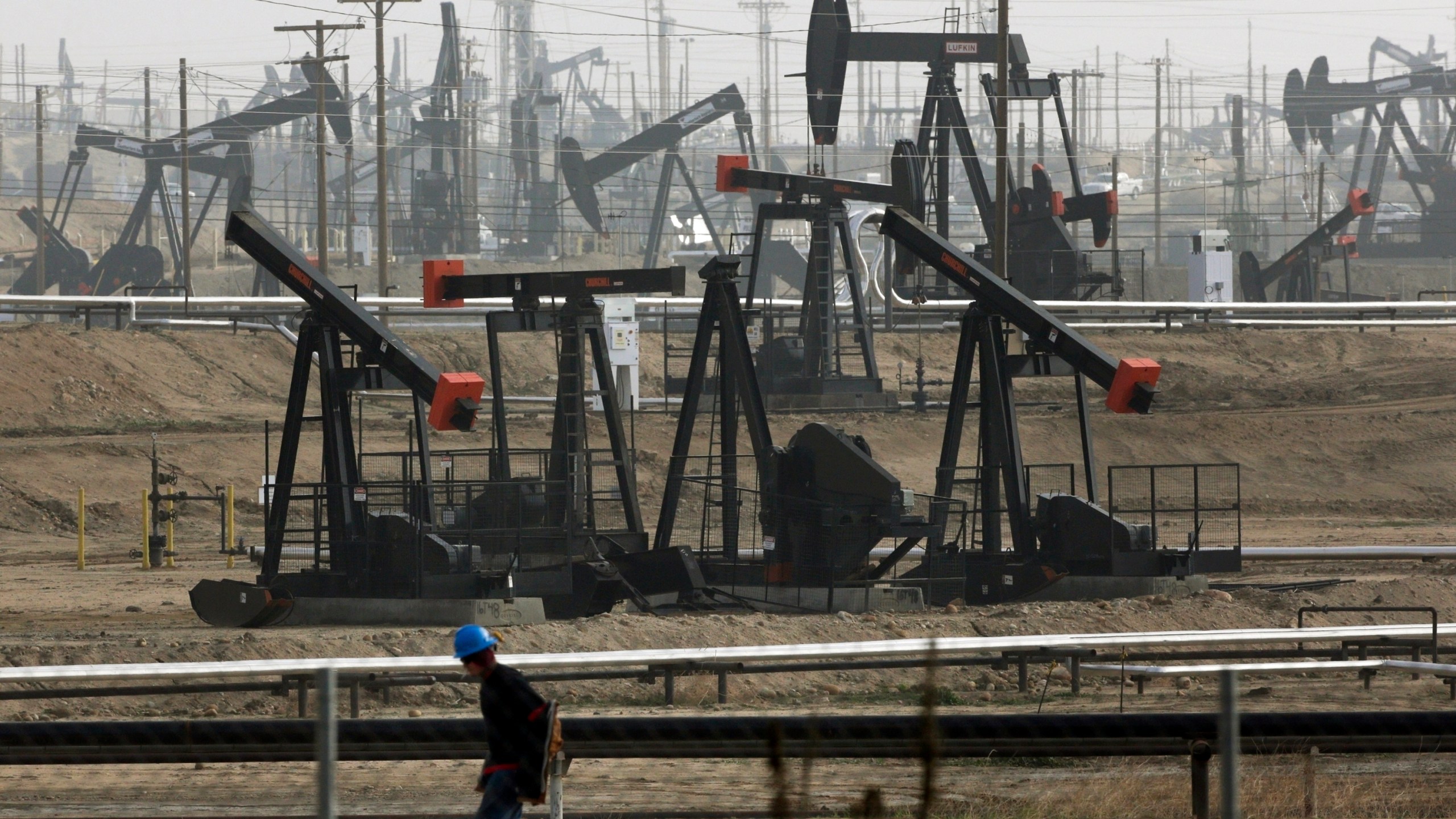 Pumpjacks are seen operating in Bakersfield on Jan. 16, 2015. (Jae C. Hong / Associated Press)