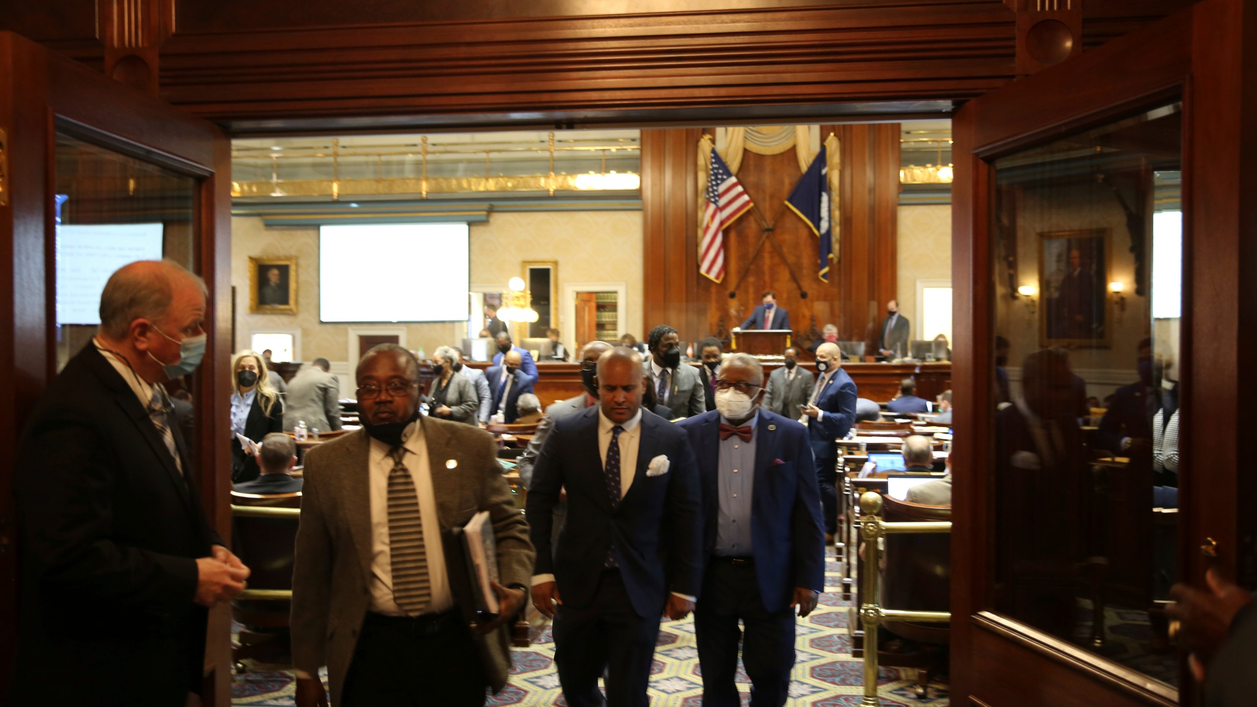 South Carolina House Democrats walk out as an abortion bill is debated on Wednesday, Feb. 17, 2021 in Columbia, S.C. (AP Photo/Jeffrey Collins)