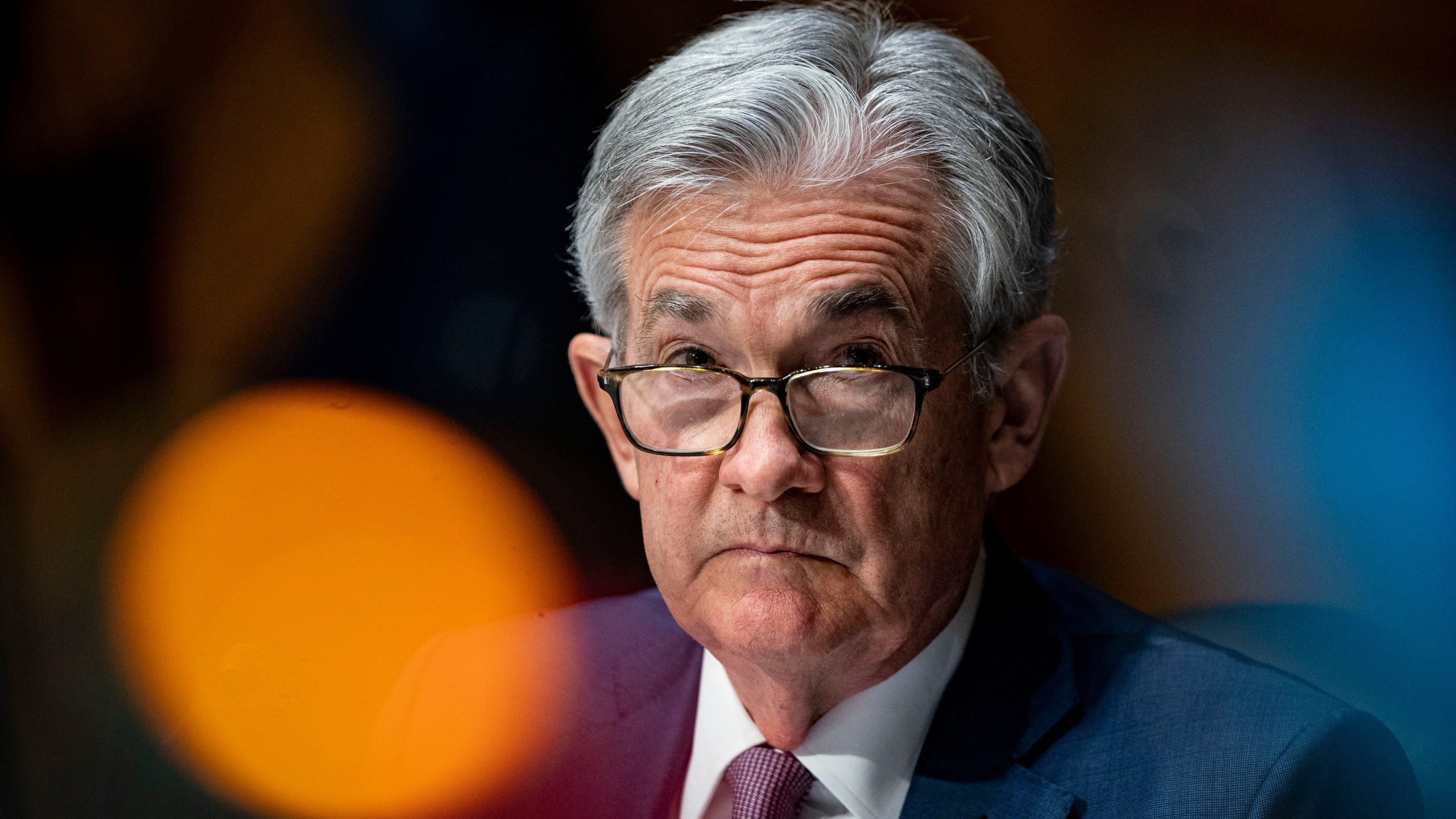 In this Dec. 1, 2020 file photo, Federal Reserve Chair Jerome Powell listens during a Senate Banking Committee hearing on Capitol Hill in Washington. Federal Reserve officials were convinced last month that the U.S. economy and job growth had slowed as coronavirus cases surged across the country. They noted that the economy's outlook is heavily dependent on the course of the virus. (Al Drago/The New York Times via AP, Pool)