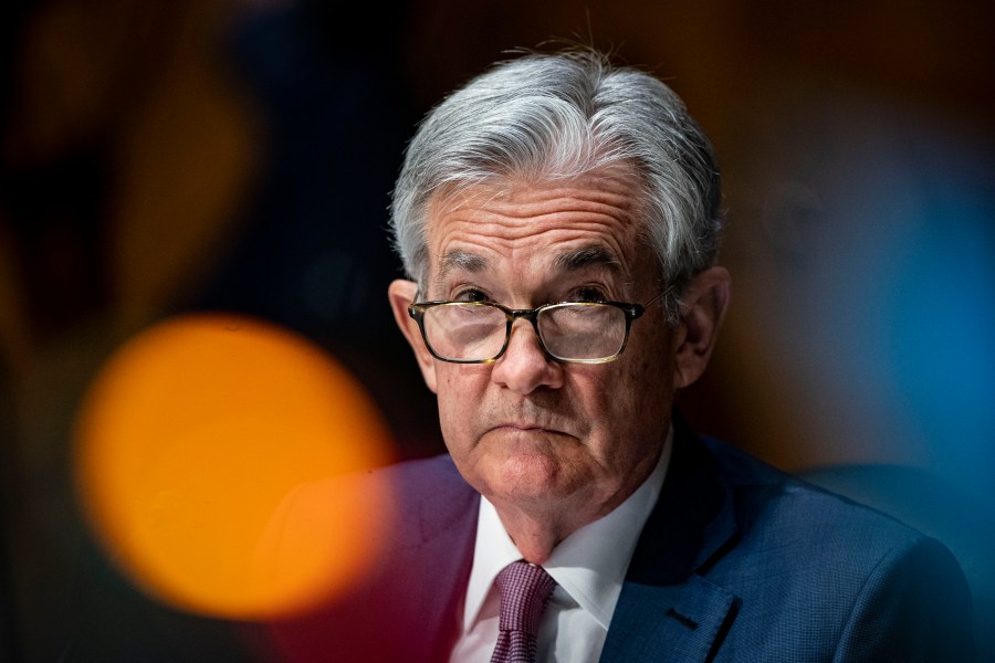 In this Dec. 1, 2020 file photo, Federal Reserve Chair Jerome Powell listens during a Senate Banking Committee hearing on Capitol Hill in Washington. Federal Reserve officials were convinced last month that the U.S. economy and job growth had slowed as coronavirus cases surged across the country. They noted that the economy's outlook is heavily dependent on the course of the virus. (Al Drago/The New York Times via AP, Pool)