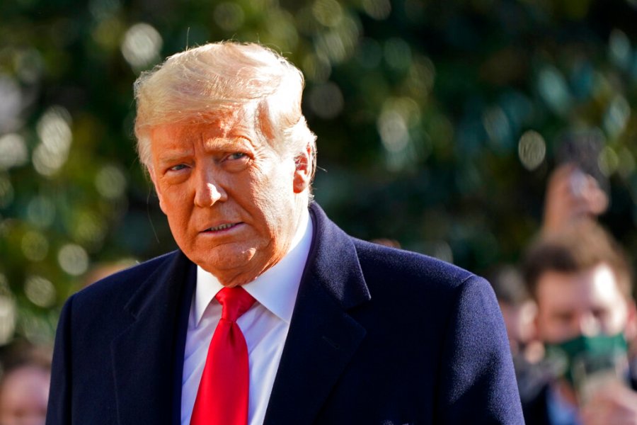 President Donald Trump walks to board Marine One on the South Lawn of the White House on Jan. 12, 2021, in Washington. (AP Photo/Gerald Herbert, File )