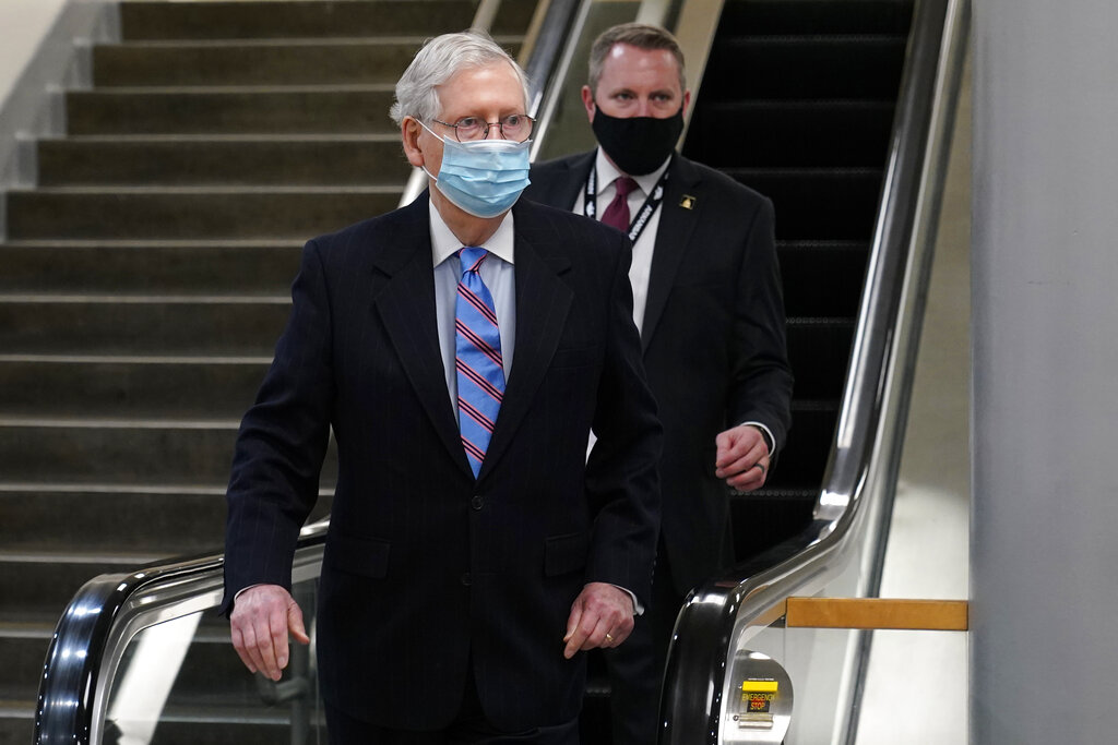 Senate Minority Leader Mitch McConnell of Ky., walks on Capitol Hill in Washington, Tuesday, Feb. 23, 2021. (AP Photo/Susan Walsh)