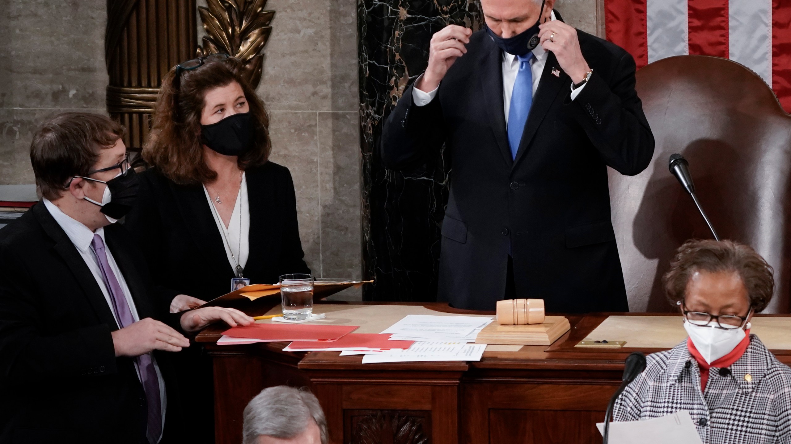 In this Jan. 6, 2021, photo, Senate Parliamentarian Elizabeth MacDonough, left, works beside Vice President Mike Pence during the certification of Electoral College ballots in the presidential election, in the House chamber at the Capitol in Washington. (AP Photo/J. Scott Applewhite)