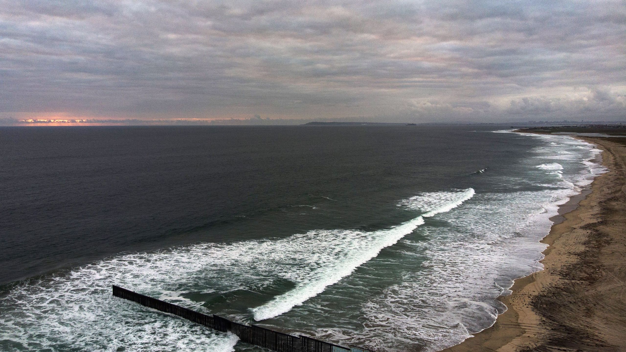 Aerial view of the Mexico-U.S. fence is seen in Playas de Tijuana, Baja California State, in the Pacific coast of Mexico, taken on June 5, 2020. (GUILLERMO ARIAS/AFP via Getty Images)