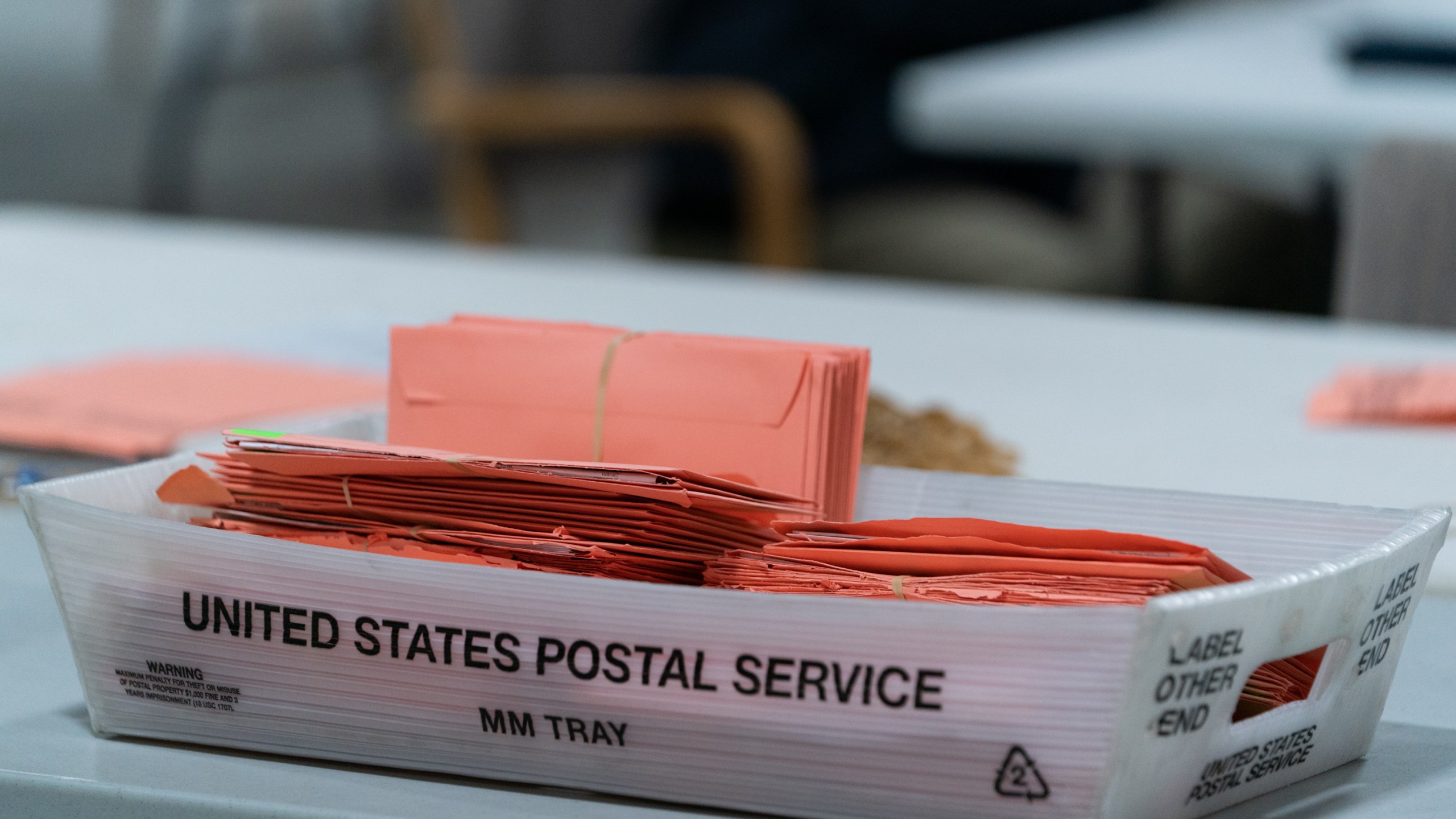 Provisional ballots are seen in a postal service tray at the Gwinnett County Board of Voter Registrations and Elections offices on Nov. 7, 2020 in Lawrenceville, Georgia. (Elijah Nouvelage/Getty Images)