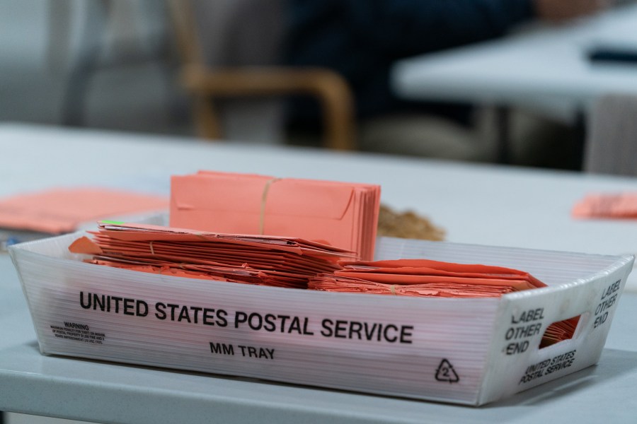 Provisional ballots are seen in a postal service tray at the Gwinnett County Board of Voter Registrations and Elections offices on Nov. 7, 2020 in Lawrenceville, Georgia. (Elijah Nouvelage/Getty Images)