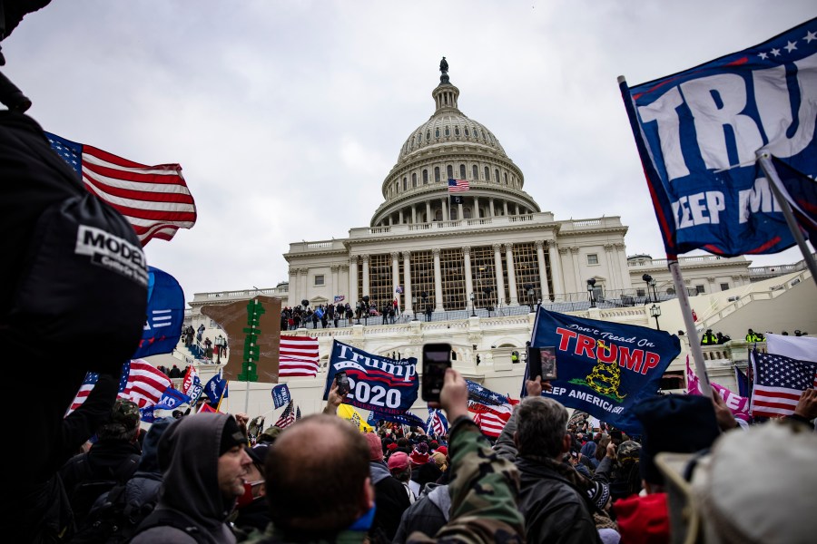 Pro-Trump supporters storm the U.S. Capitol following a rally with President Donald Trump on Jan. 6, 2021 in Washington, D.C. Trump supporters gathered in the nation's capital today to protest the ratification of President-elect Joe Biden's Electoral College victory over President Trump in the 2020 election. (Samuel Corum/Getty Images)