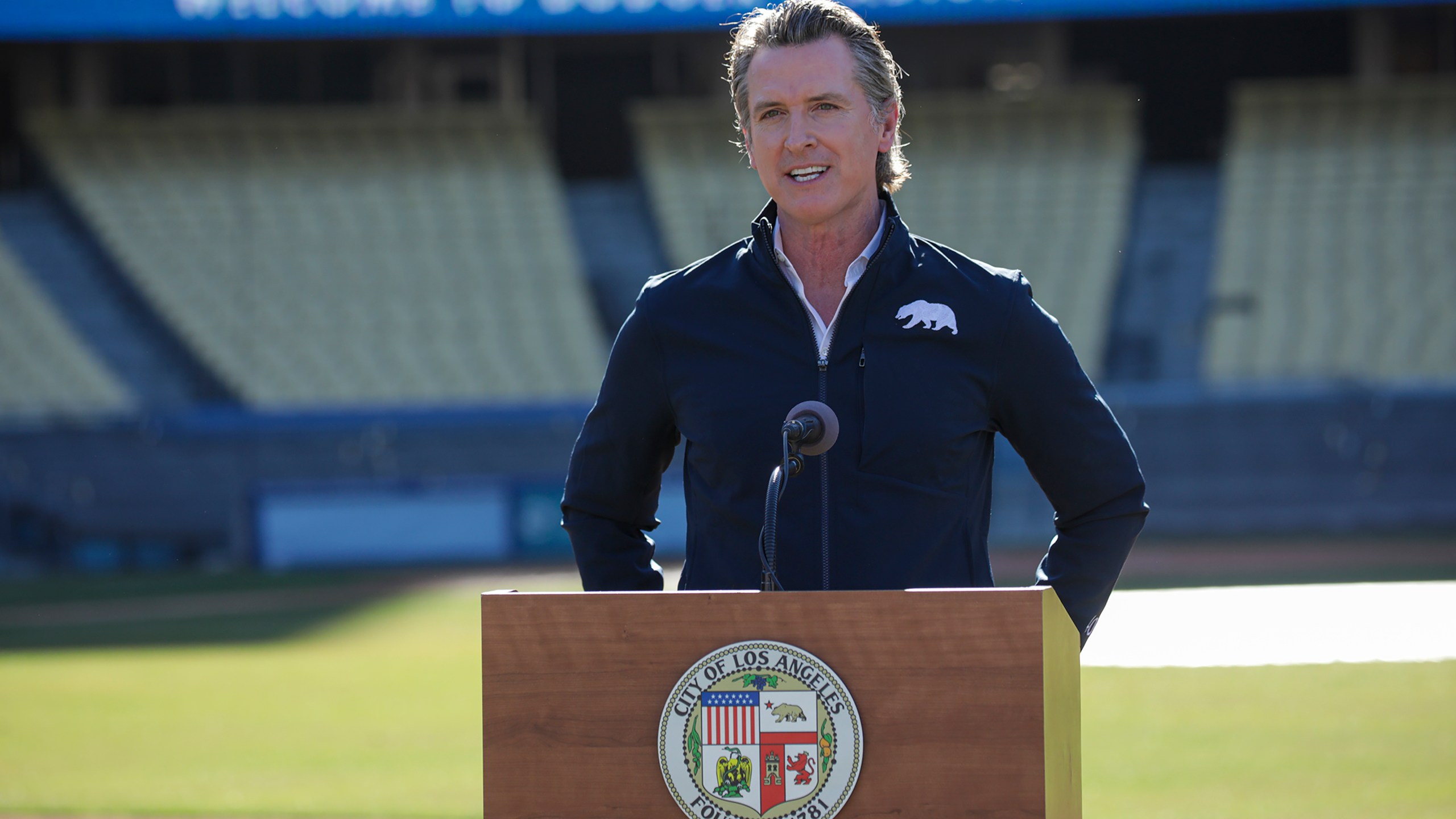 California Gov. Gavin Newsom addresses a press conference held at the launch of mass COVID-19 vaccination site at Dodger Stadium on Jan. 15, 2021 in Los Angeles. (Irfan Khan / POOL / AFP via Getty Images)