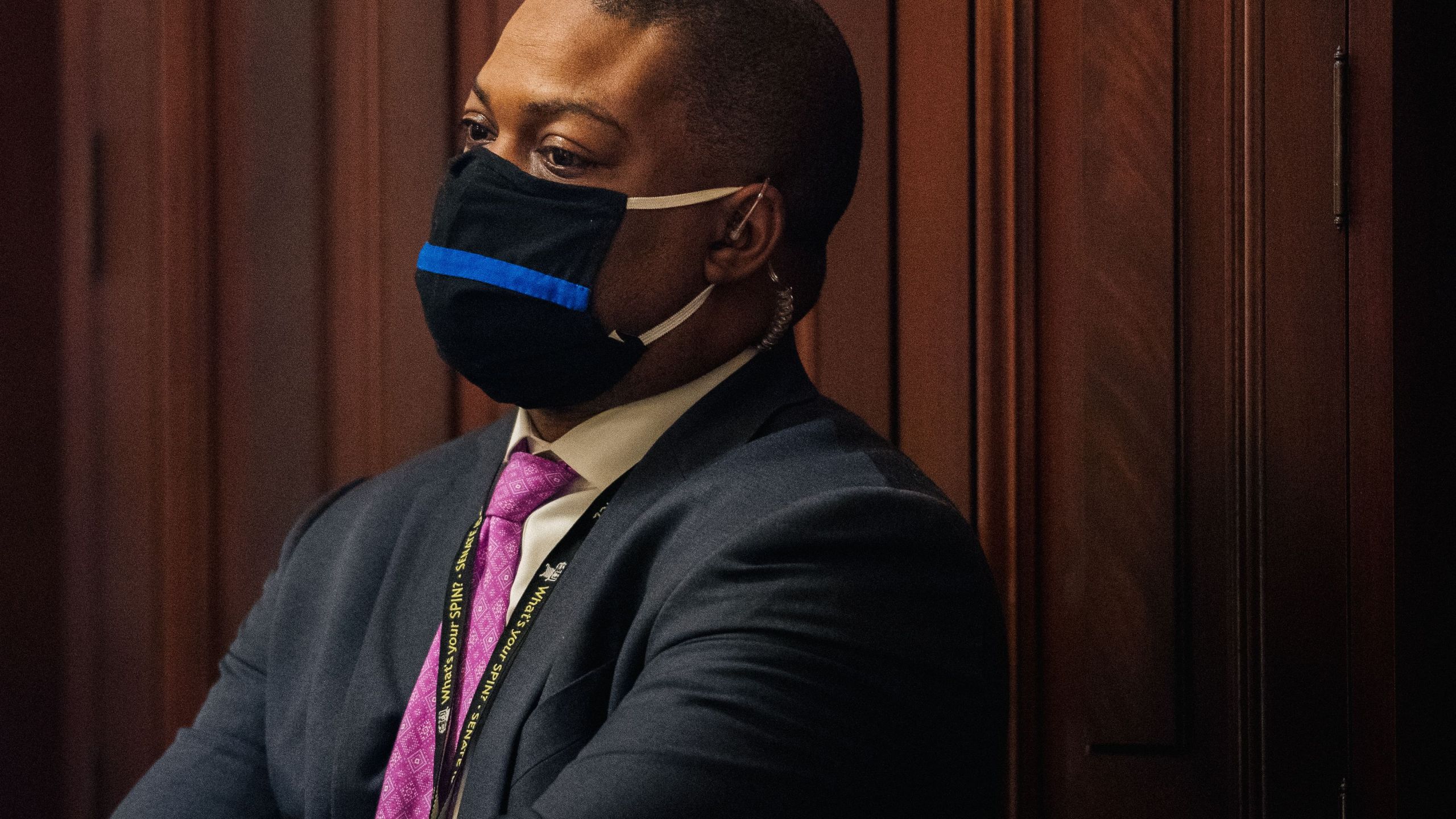 Capitol Police Officer Eugene Goodman watches newly released video footage of the Jan. 6 attack during the second day of Trump's second impeachment trial, on Feb. 10, 2021, in Washington, D.C (BRANDON BELL/AFP via Getty Images)