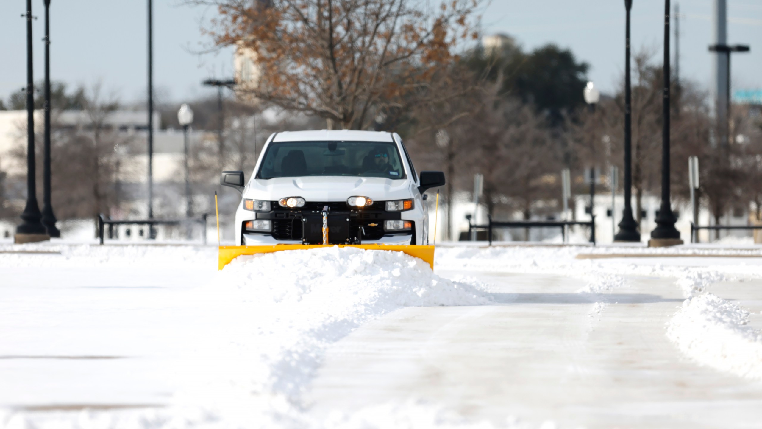 Snow is plowed on the parking lot at Dickies Arena after a snow storm on February 16, 2021 in Fort Worth, Texas. (Ron Jenkins/Getty Images)