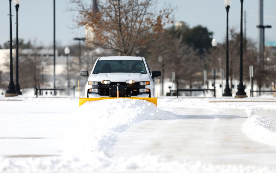 Snow is plowed on the parking lot at Dickies Arena after a snow storm on February 16, 2021 in Fort Worth, Texas. (Ron Jenkins/Getty Images)