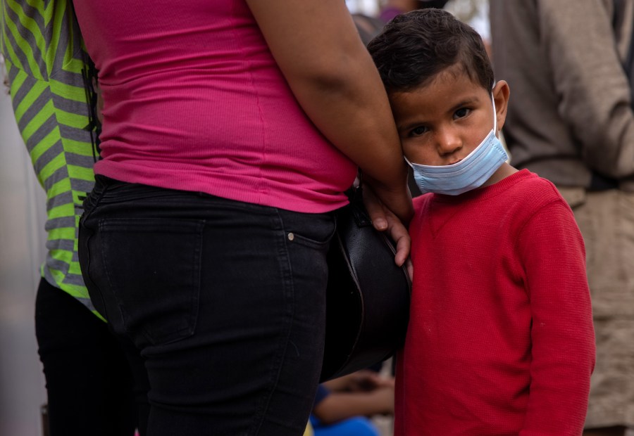 Honduran asylum seekers wait to register at a migrant camp at the U.S.-Mexico border on February 23, 2021 in Matamoros, Mexico. (John Moore/Getty Images)