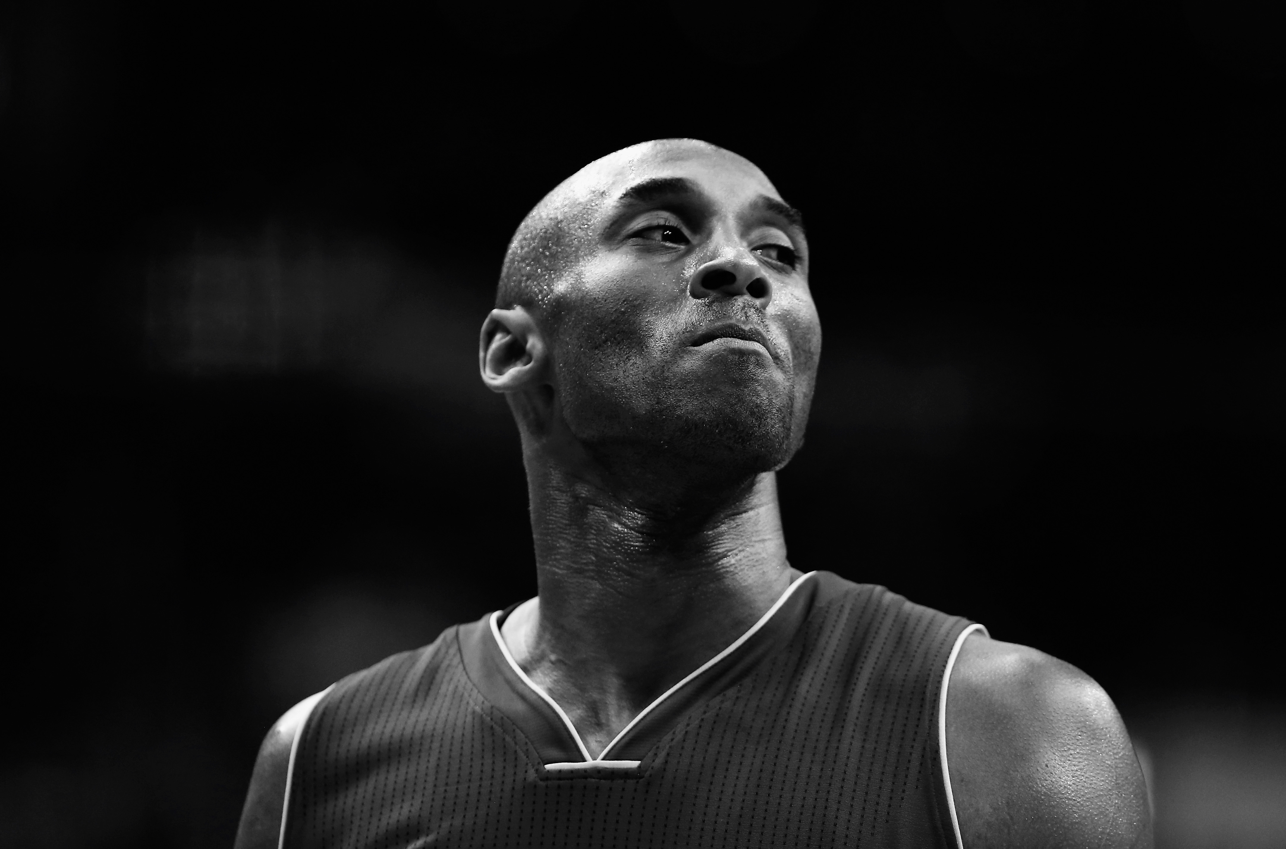 DECEMBER 02: (Editors Note: Image has been converted to black and white) Kobe Bryant #24 of the Los Angeles Lakers looks on against the Washington Wizards in the first half at Verizon Center on December 2, 2015 in Washington, DC. (Rob Carr/Getty Images)