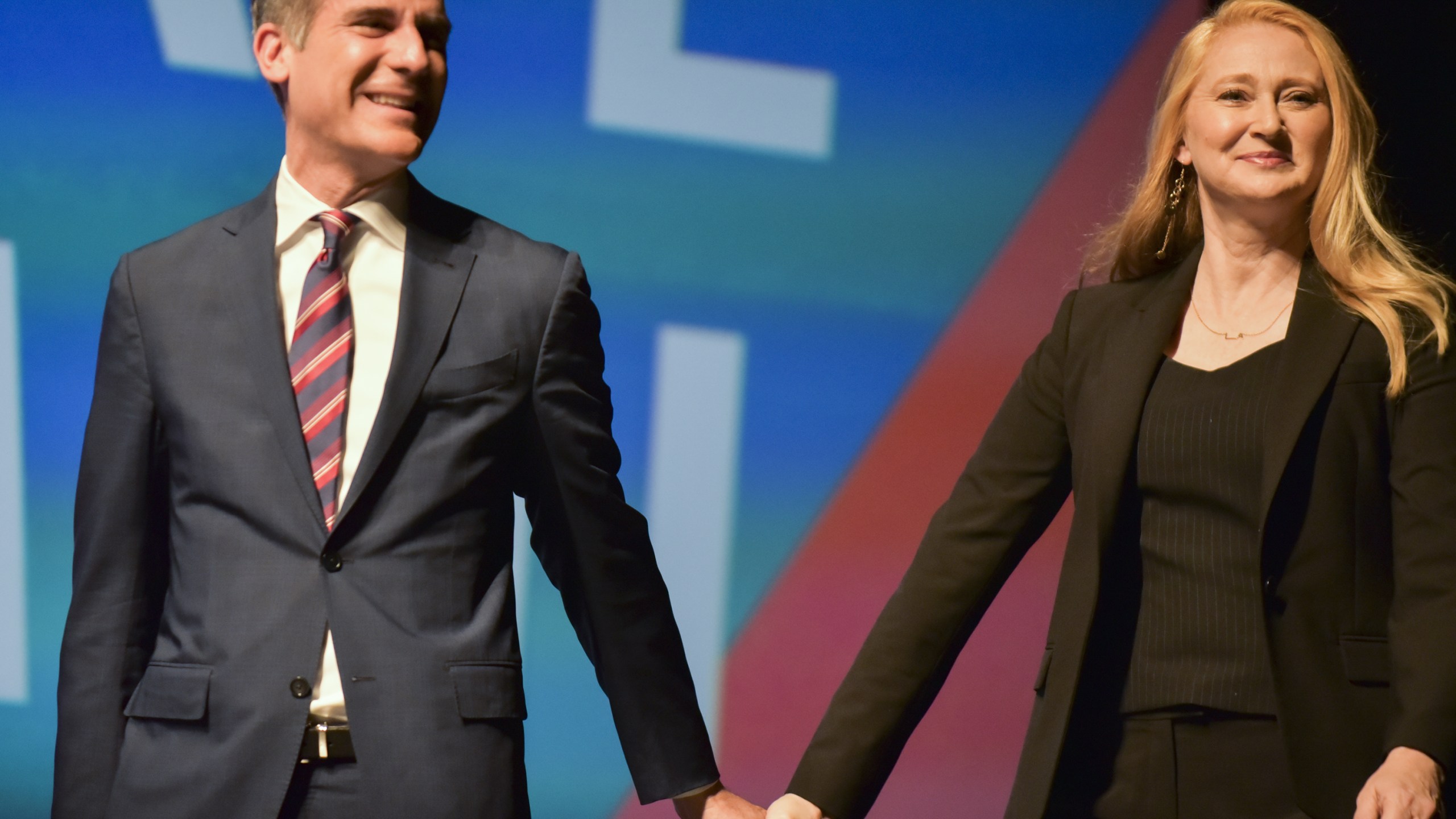 Los Angeles Mayor Eric Garcetti and his wife, Amy Wakeland, appear on stage at the United State of Women Summit 2018 - Day 1 on May 5, 2018 in L.A. (Rodin Eckenroth/Getty Images)