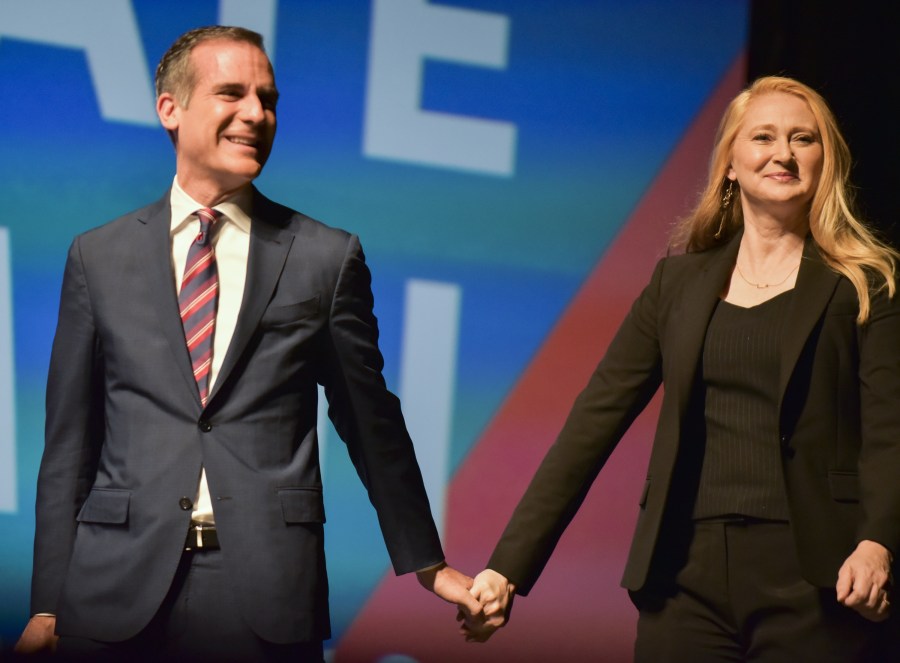 Los Angeles Mayor Eric Garcetti and his wife, Amy Wakeland, appear on stage at the United State of Women Summit 2018 - Day 1 on May 5, 2018 in L.A. (Rodin Eckenroth/Getty Images)