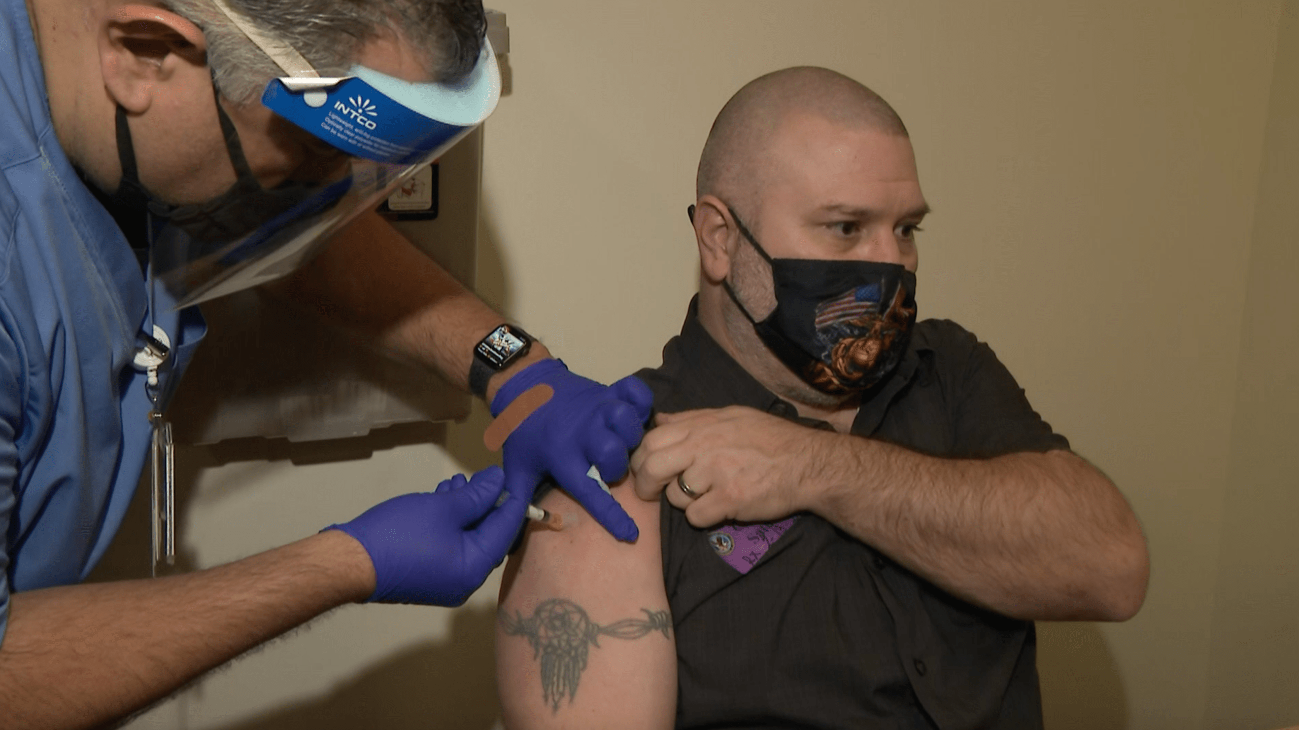 A man receives his COVID-19 vaccine shot at VA Loma Linda Healthcare System on Feb. 13, 2021. (KTLA)