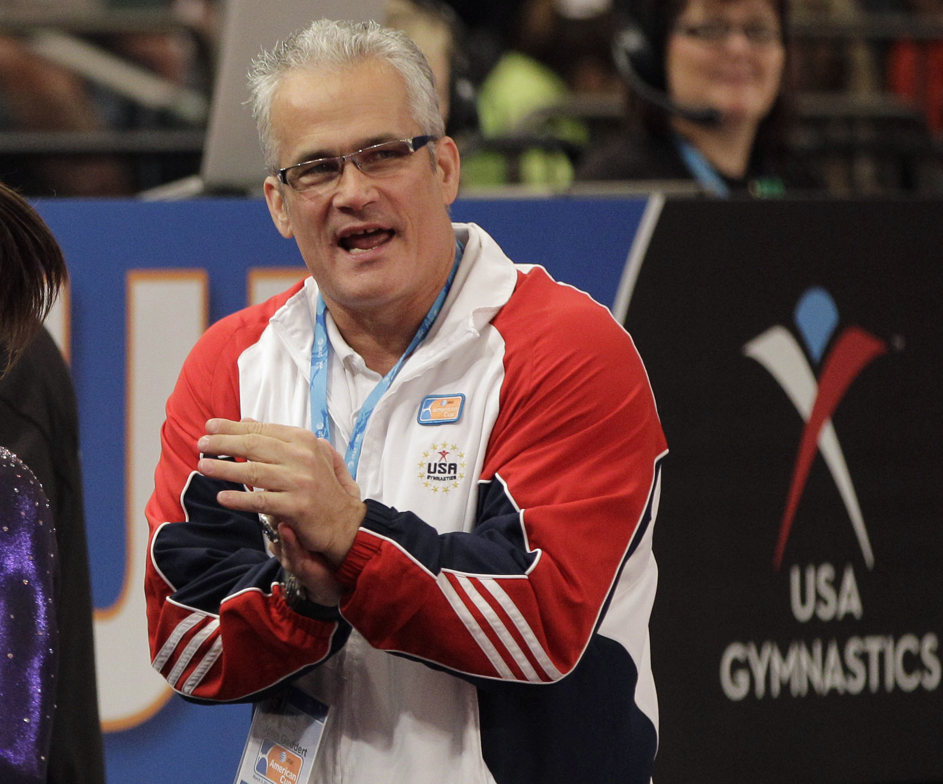 In this March 3, 2012, file photo, gymnastics coach John Geddert is seen at the American Cup gymnastics meet at Madison Square Garden in New York. Prosecutors in Michigan filed charges Thursday, Feb. 25, 2021, against Geddert, a former U.S. Olympics gymnastics coach with ties to disgraced sports doctor Larry Nassar. Geddert was head coach of the 2012 U.S. women's Olympic gymnastics team, which won a gold medal. (AP Photo/Kathy Willens, File)