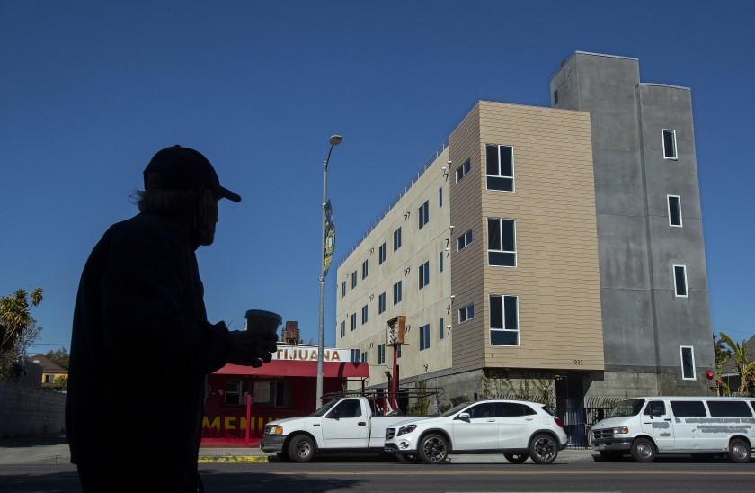 An undated photo shows a completed project on Vernon Ave. in Los Angeles by RMG Housing, a private company that is building permanent supportive housing for homeless people with no government subsidy. This building will provide 21 units.(Mel Melcon / Los Angeles Times)