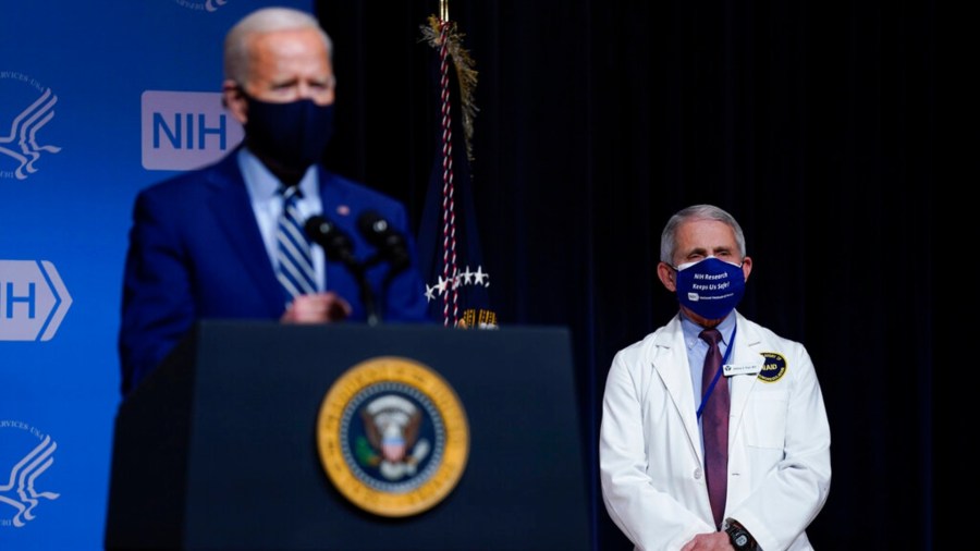 President Joe Biden speaks during a visit to the Viral Pathogenesis Laboratory at the National Institutes of Health, Thursday, Feb. 11, 2021, in Bethesda, Md. (AP Photo/Evan Vucci)