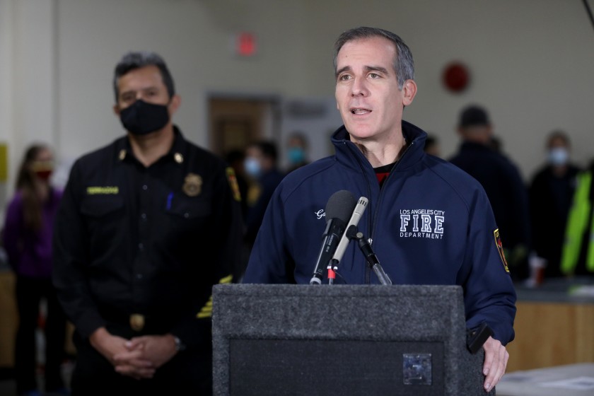 Los Angeles Fire Chief Ralph M. Terrazas stands behind Mayor Eric Garcetti in this undated photo. (Gary Coronado/Los Angeles Times)