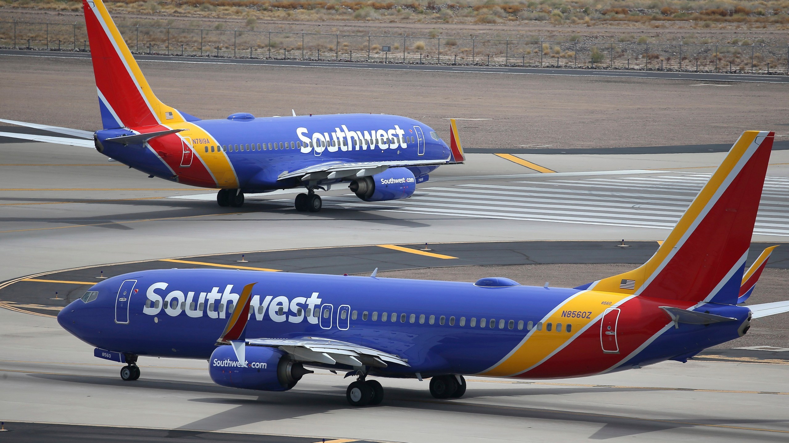 This Wednesday, July 17, 2019 file photo shows Southwest Airlines planes at Phoenix Sky Harbor International Airport in Phoenix. (AP Photo/Ross D. Franklin, File)