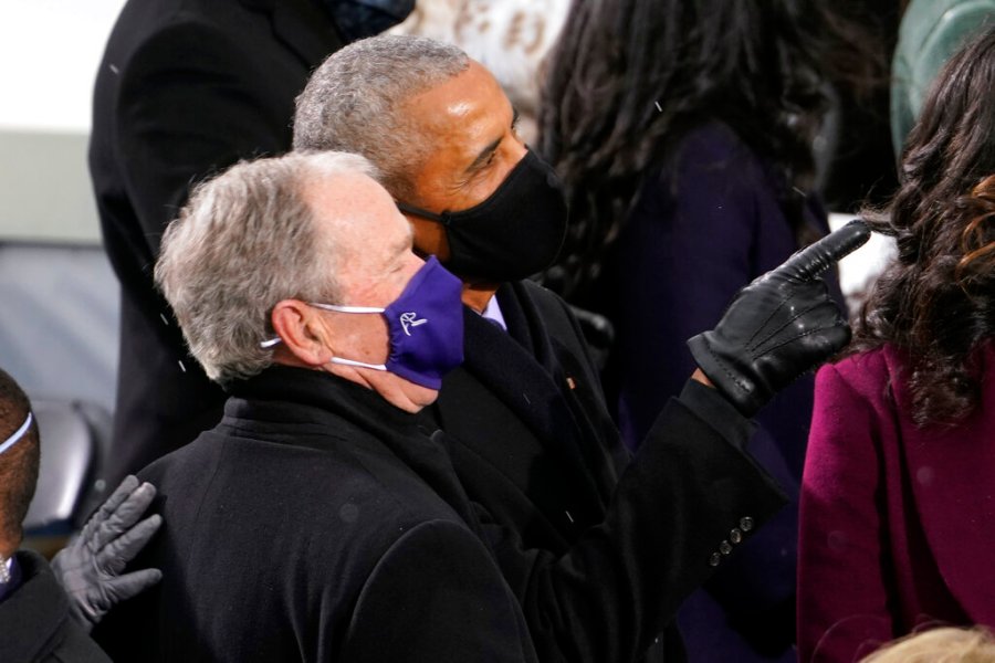 In this Jan. 20, 2021, file photo former President Barack Obama and former President George W. Bush look up to the crowd as they arrive for the 59th Presidential Inauguration at the U.S. Capitol for President-elect Joe Biden in Washington. (AP Photo/Andrew Harnik, File)